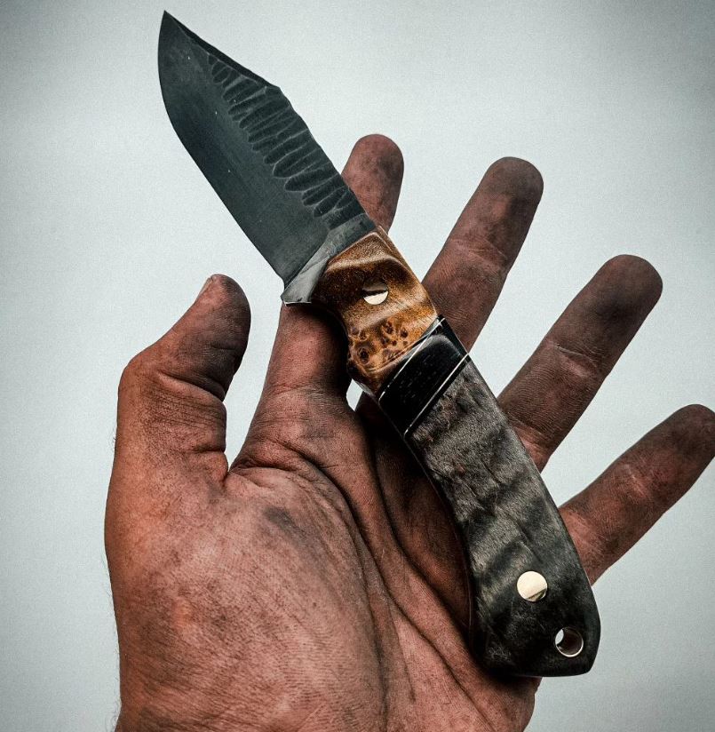Close up view of a knife using segmented knife scales